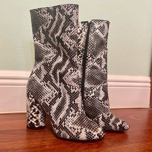 Snakeskin mid-calf booties